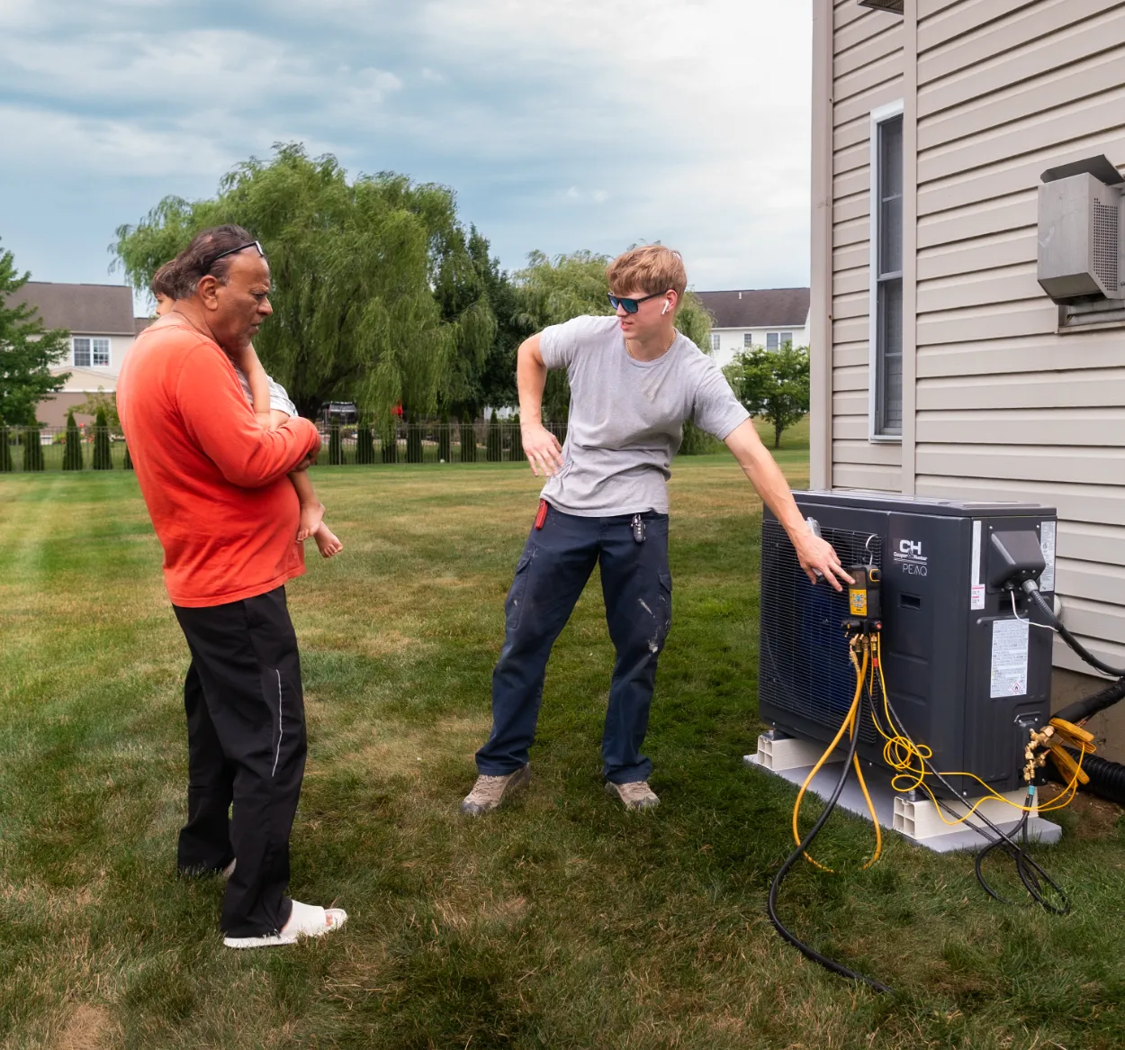 Mr. Spits Technician talking to Customer